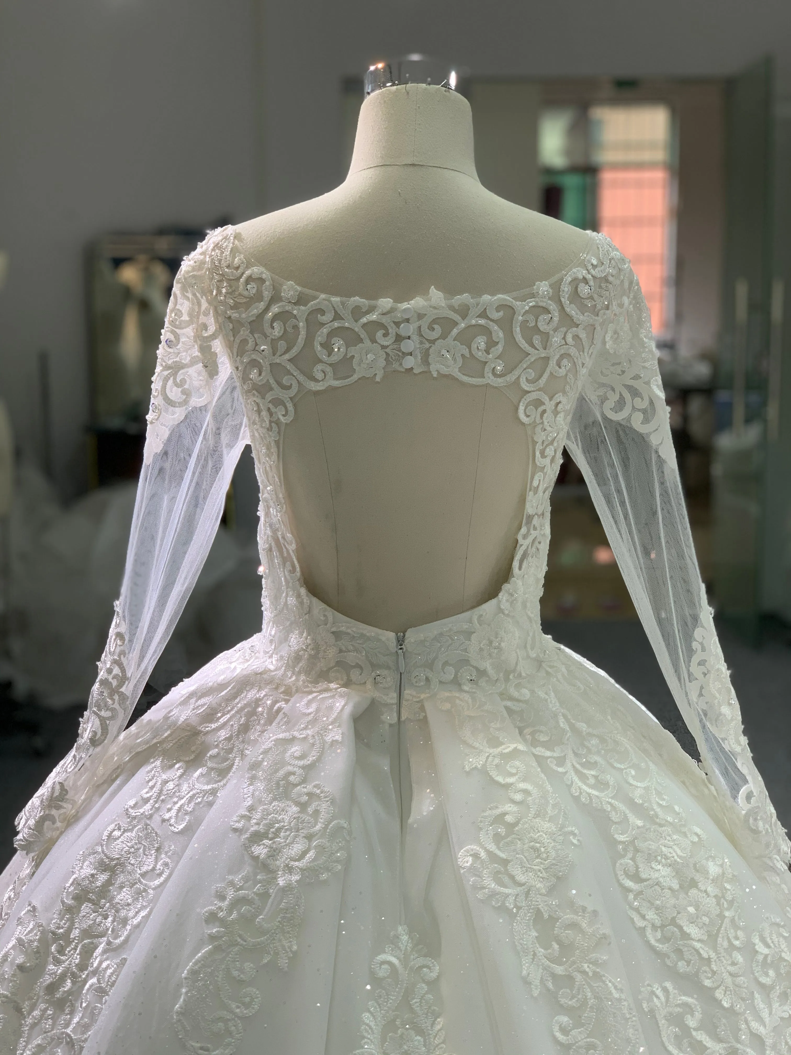 BYG lace beaded long sleeves wedding dress