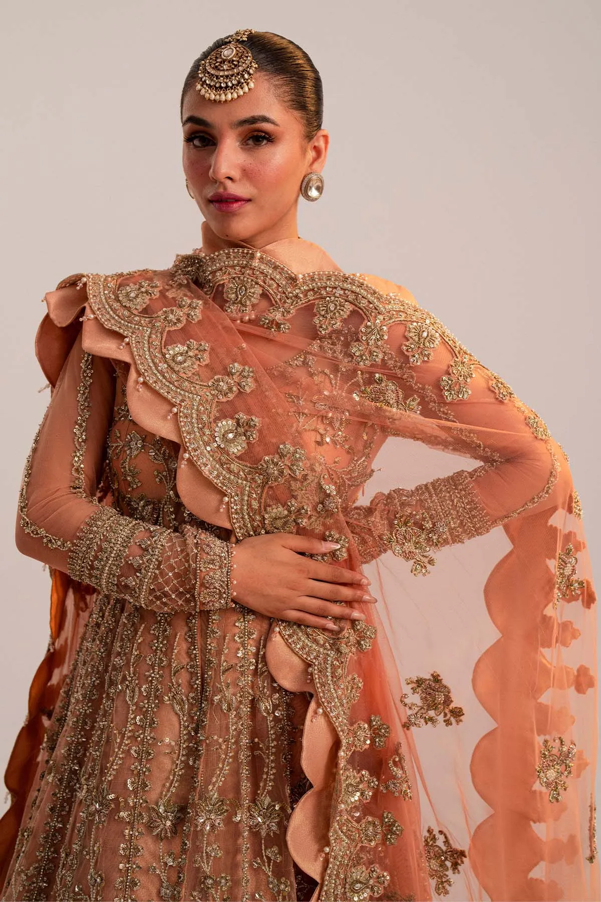 Pakistani Bridal Dress in Peach Lehenga Pishwas Style