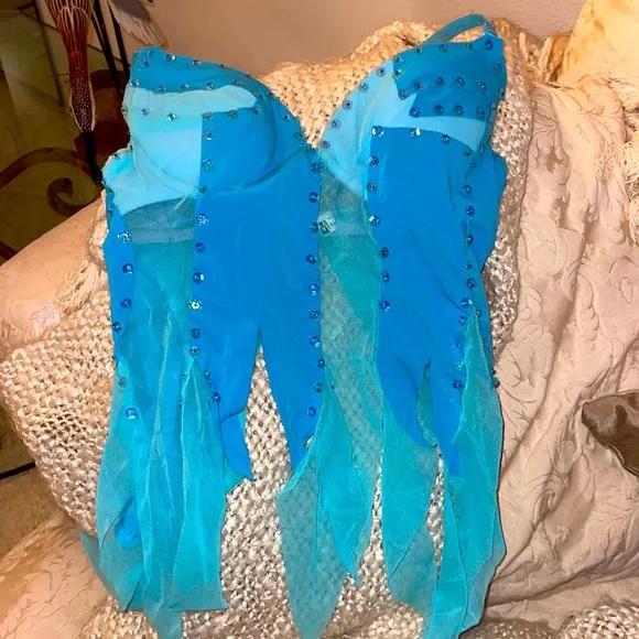 Torquoise Bustier 34b or C cup.  Light blue is sheer