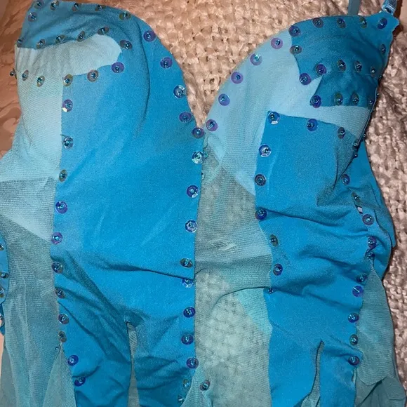 Torquoise Bustier 34b or C cup.  Light blue is sheer